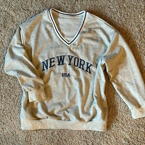 Brand new, never worn NY USA v-neck oversized sweatshirt